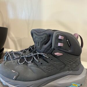 Brand new HOKA hiking boot. Never worn, gifted to me.